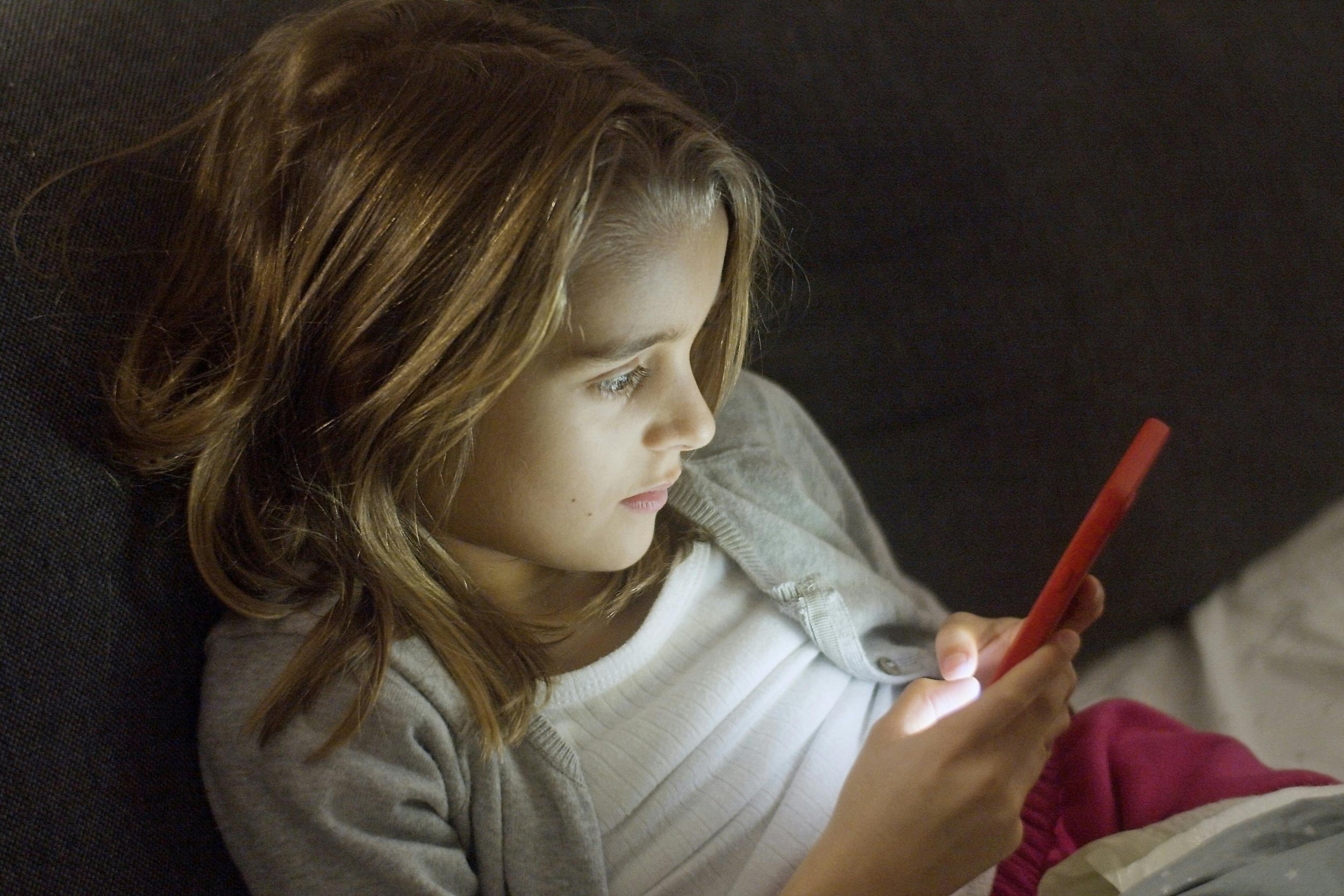 Girl looking at mobile phone